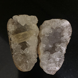 Related Quartz crystal geode with calcite