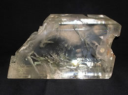 Related Calcite Crystal With Water Bubble